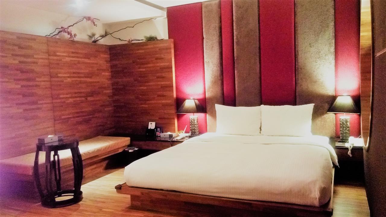 Her Home Spa Motel Синьин Экстерьер фото